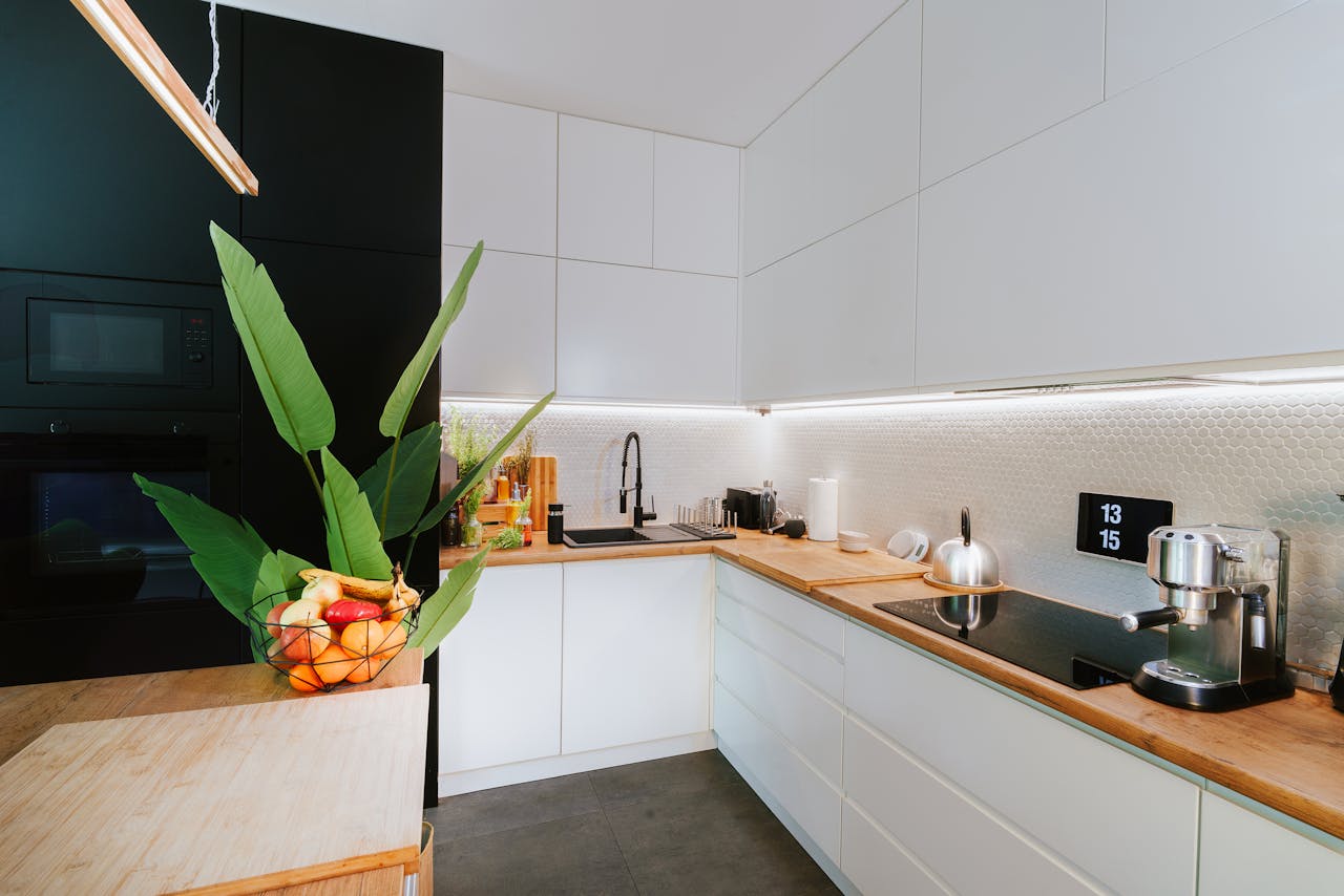 who-we-are Sleek kitchen featuring smart tech and minimalist design, perfect for modern homes.